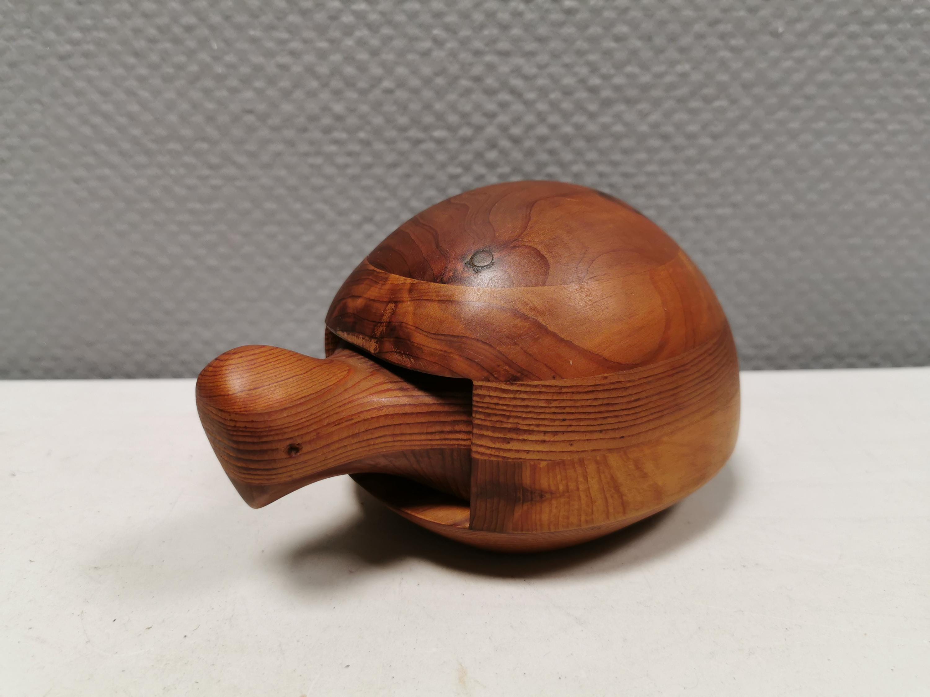 A Deborah Bump jewelry box made of several types of wood in the shape of a turtle 1979.