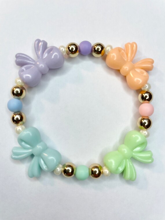 Charming Bow-Themed Bracelet Amazon.com: Pearl Bracelets for Women Dainty Bow Bracelet  main image 3