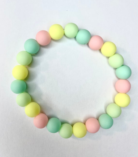 Plastic arm hotsell bracelets