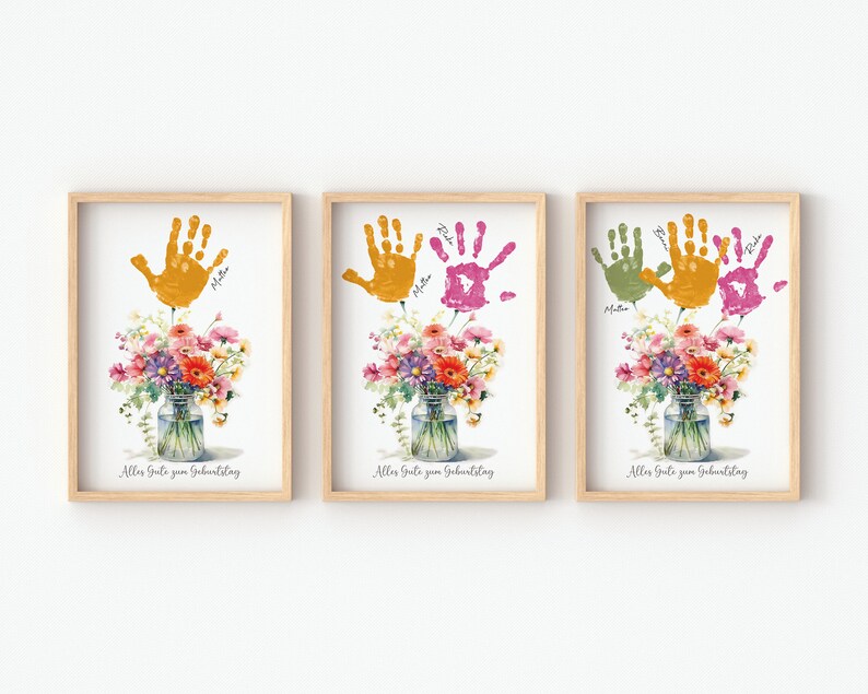 May include: Three framed prints with handprints in yellow, green, and pink, with the text "Aller Gute zum Geburtstag" at the bottom of each print. Each print features a watercolor bouquet of flowers in a glass jar.