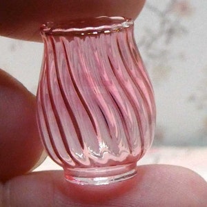 Twisted tulip vase in cranberry glass