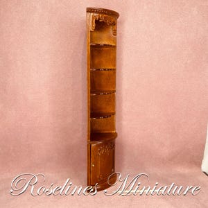 Miniature corner bookcase in walnut. Dollhouse miniature furniture scale 1:12