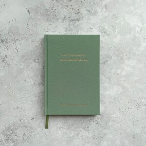 May include: A green journal with the text "Shift Your Mindset for an Internal Glow Up" on the front cover.
