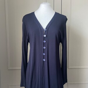 Jaqueta azul vintage esculpida por Jean Muir