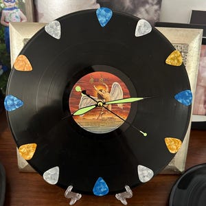 vinyl record upcycled to clock .