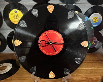 Vinyl record clock featuring self titled album Santana