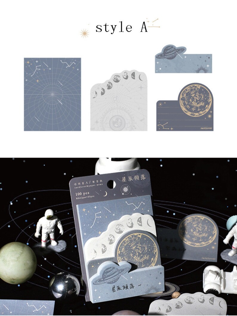 May include: A set of 100 celestial-themed sticky notes in a blue and white colour scheme. The notes feature a variety of designs, including stars, planets, and moons. The packaging includes the text "cardlover paper memo" and "星辰傾落".