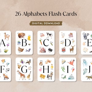 May include: A set of 26 alphabet flash cards featuring watercolor illustrations of various objects and animals. Each card has a letter of the alphabet and a corresponding image, such as an apple for A, a bear for B, and a castle for C.