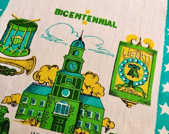 Vintage linen tea towel. Vivid illustration of Independence Hallin Philadelphia, prominently displaying the year 1776