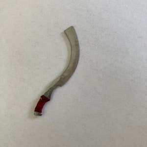 Miniature khopesh unsharpened
