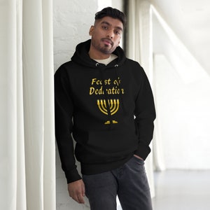 May include: Black hooded sweatshirt with a gold menorah and the text "Feast of Dedication" printed on the front.
