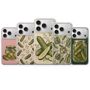 May include: Five smartphone cases featuring various pickle-themed illustrations. Designs include jars of pickles, sliced cucumbers, and whole cucumbers with dill sprigs on backgrounds of soft pink, light beige, cream, and dark forest green.