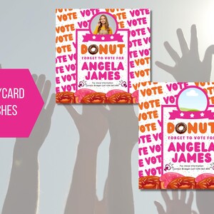 May include: Pink and white 3x3 inch sticker with a donut graphic and the text "DONUT FORGET TO VOTE FOR ANGELA JAMES". The background is a white pattern of the word "VOTE" repeated.