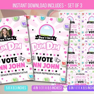 May include: Set of three pink and white campaign posters with the text "Don't be a Dum DUm, Vote Ann John". The posters include a photo placeholder, stars, and Dum Dums candy graphics. Sizes are 5.8 x 8.3 inches, 4 in 1 (11 x 8.5 inches), and 6 in 1 (11 x 8.5 inches).