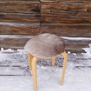 Reindeer hide seating pad