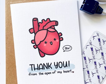 May include: A pink and red cartoon heart with a smiling face and a speech bubble that says "thx!"  The heart is on a white card with the text "THANK YOU! from the apex of my heart".