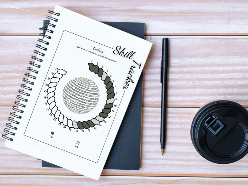 May include: A notebook with a coding skill tracker design. The notebook has a spiral binding and features a circular graphic with numbers and the text "Coding Skill Tracker." A black pen and a coffee cup are also on the wooden surface.