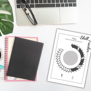 May include: A workspace scene with a laptop, glasses, and a printed "Skill Tracker" sheet for coding. A cup of coffee, a notebook, and a journal are also present. The tracker has a binary code sphere design.