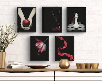 May include: Five black framed prints with different images. The images include a red apple, an hourglass, a white chess piece, a red ribbon, and a white tulip.