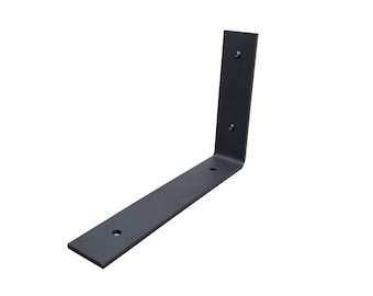 Single industrial-style bracket for 25-40cm wide shelves. Available in black or white. Perfect for rustic, MDF, or melamine shelves.