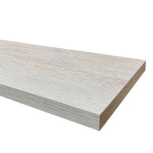 May include: A whitewashed wood shelf with a light wood grain pattern. The shelf is made of a durable material and is perfect for adding storage and style to any room.