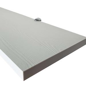 May include: White shelf with a wood grain finish and a white edge. The shelf has a silver metal bracket on the top.