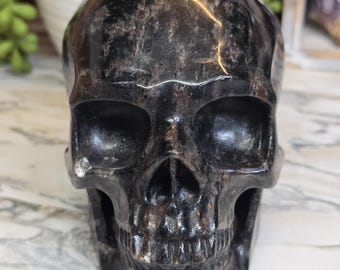 OOPSIE Gold Flash Astrophyllite Crystal Skull 5in 3lbs 6.6oz