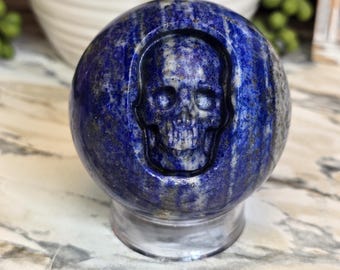 Lapiz Lazuli Sphere with skull carving 2.61in 1lbs 0.3oz UV reactive