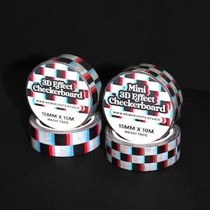 May include: Two rolls of black and white checkered washi tape with a 3D effect. The tape is 15mm wide and 10 meters long. The tape is labeled "3D Effect Checkerboard" and "Mini 3D Effect Checkerboard".