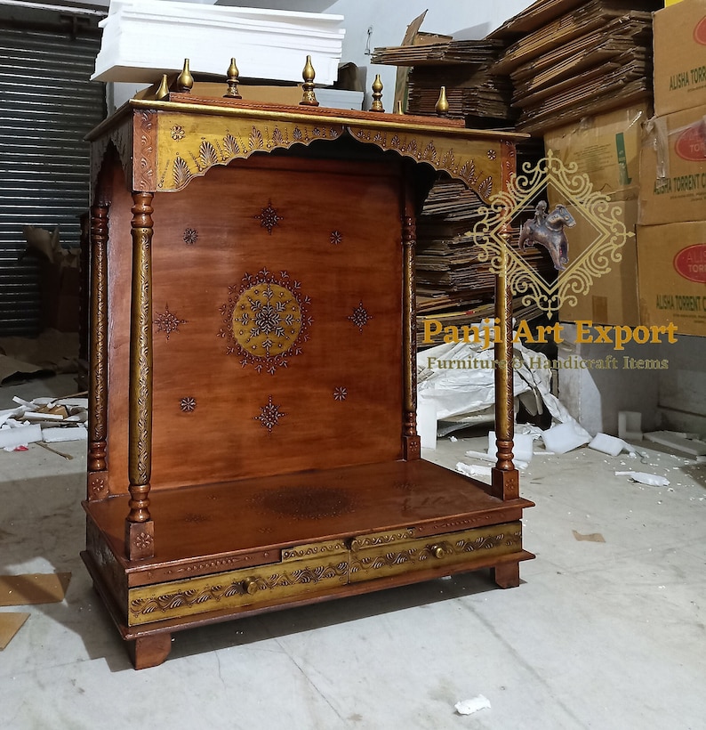 Premium Solid Wood Temple for Home featuring handcrafted Indian carving, devotional diya, elegant storage drawer and timeless traditional architecture for creating a peaceful worship space with Lakshmi, Ganesha and Krishna idols. #WoodenMandir #MandirAccessories #TempleDecor #PrayerFurniture #LuxuryHomeDecor #IndianInteriors #WoodenFurniture #HomeTemple #DecorInspiration #ArtisanMade