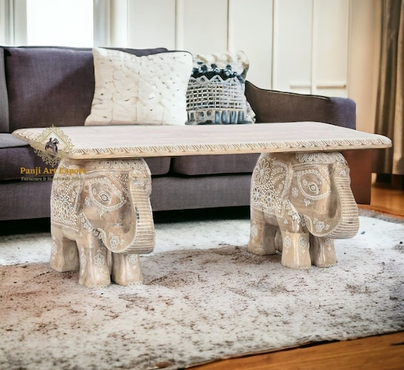 象の彫刻が施された木製テーブル 彫刻装飾の木製テーブル