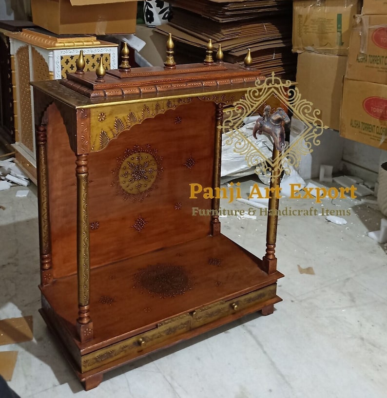 Premium Wooden Temple for Home with traditional Indian carving, decorative finials, functional storage drawer and sacred worship space for Lakshmi, Ganesha, Krishna, Radha Krishna and Bal Gopal idols. Beautiful handcrafted pooja mandir for apartments, villas and meditation rooms. #MandirForHome #WoodenTemple #PrayerRoomDecor #TempleFurniture #HandcraftedMandir #IndianHandicrafts #SacredSpace #HomeTemple #MadeInIndia #WoodCarving