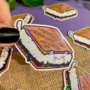 Pegatina holográfica Smore Cat - Calcomanía de vinilo para computadoras portátiles, botellas de agua, planificadores y diarios