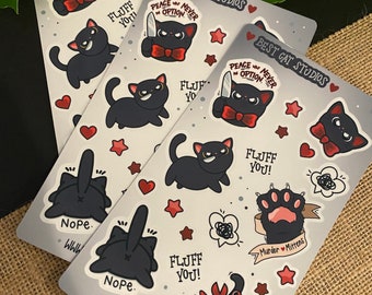 May include: Three sheets of stickers featuring black cats with different expressions and sayings. The stickers include sayings like "Peace was never an option", "Fluff you", "Nope", and "Murder Mittens".