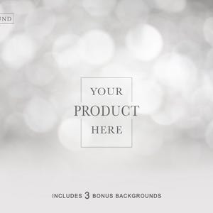 May include: A blurred, silver-toned background with a bokeh effect. The text "YOUR PRODUCT HERE" is centered within a square frame. The top left corner features "THE BACKGROUND COMPANY" text. The bottom text reads "INCLUDES 3 BONUS BACKGROUNDS".