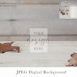 Puede incluir: Fondo de madera blanco con dos hojas marrones y el texto "YOUR design HERE". Fondo digital JPEG.