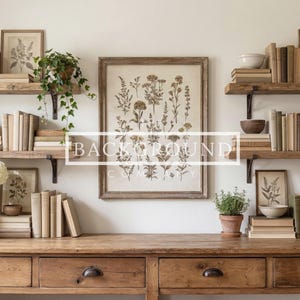 May include: A rustic wooden desk with drawers, adorned with a white pitcher of flowers, books, and framed botanical prints. Floating shelves above display more books, plants, and decorative items, creating a cozy, vintage-inspired interior.