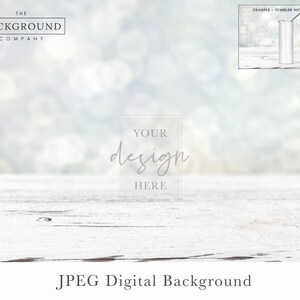 May include: A digital background featuring a white wooden surface with a blurred light bokeh backdrop. The image includes a central rectangular frame with the text 'YOUR design HERE' and a small inset showing a tumbler example.