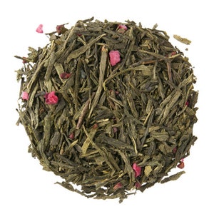 May include: Green tea leaves with dried pink fruit pieces. The tea is loose leaf and ready to be brewed.