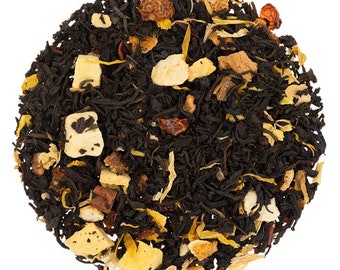 May include: A close-up of a blend of black tea leaves, orange peel, and other fruit pieces. The tea is a mix of black, orange, and brown.