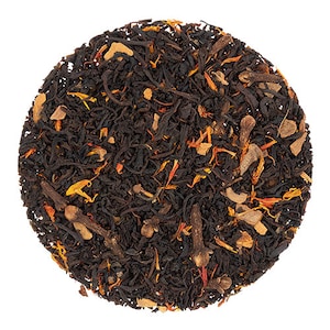 May include: A close-up of a blend of black tea leaves, orange peel, cinnamon sticks, and cloves.