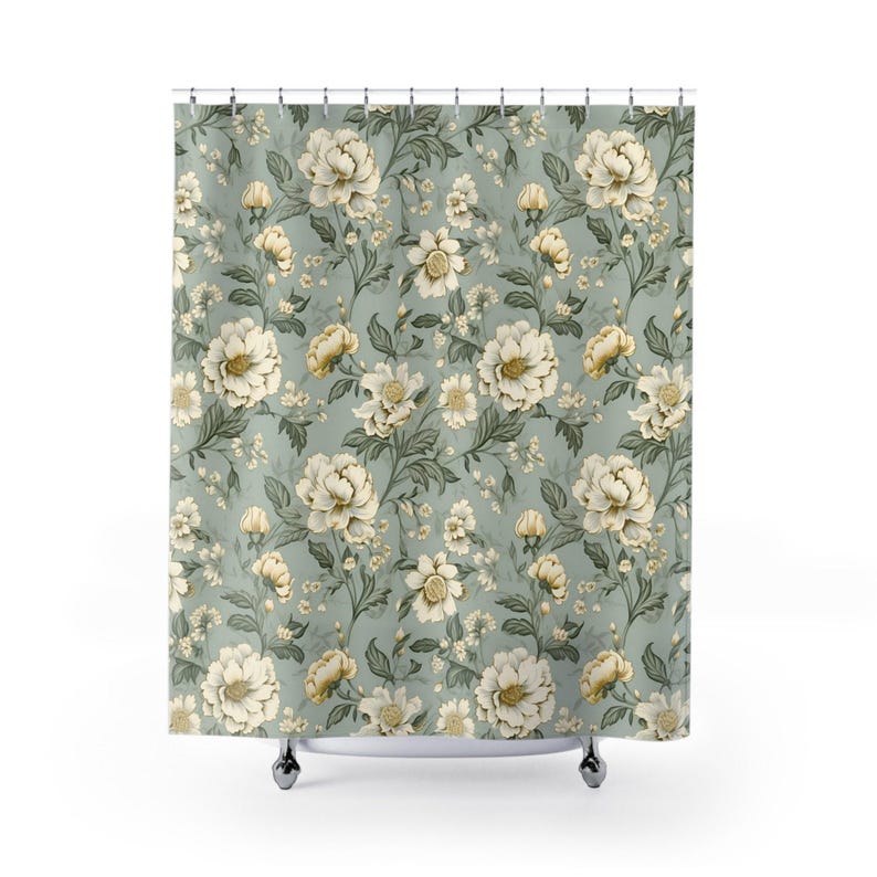 a shower curtain with a floral pattern on it