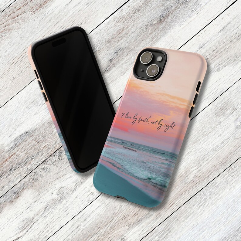 a phone case with a picture of a sunset and a quote on it