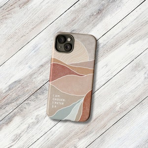 a phone case sitting on top of a wooden floor