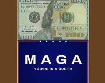 May include: A digitally altered image featuring a US $100 bill at the top and a blue banner below. The banner reads "MAGA YOU'RE IN A CULT!!!" in white text, with "LOL" at the bottom. The background is brown.