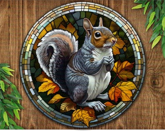 May include: A stained glass style illustration of a gray squirrel sitting on a bed of autumn leaves. The squirrel is looking to the right and has a bushy tail.