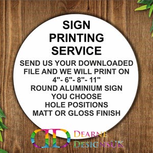 May include: A white circular sign with black text on a wooden background. The sign offers a printing service for round aluminium signs in various sizes, including 10 cm, 15 cm, 20 cm, and 28 cm. It also mentions options for hole positions and finishes.