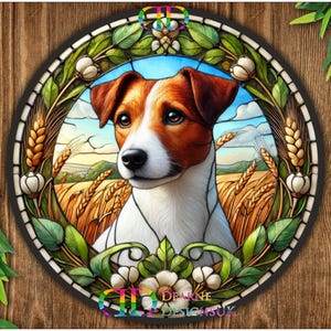 May include: A round, stained-glass style image featuring a Jack Russell Terrier dog. The dog has brown and white fur and is set against a wheat field and blue sky. The image is framed with green leaves, wheat stalks, and white flowers.