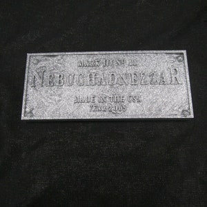 May include: A silver metal plaque with the text "Dist. by No. 2 Nebuchadnezzar Made in the USA Year 2009".
