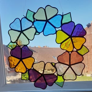 Wreath of yellow purple and blue flowers - stained glass, suncatcher, window or wall hanging